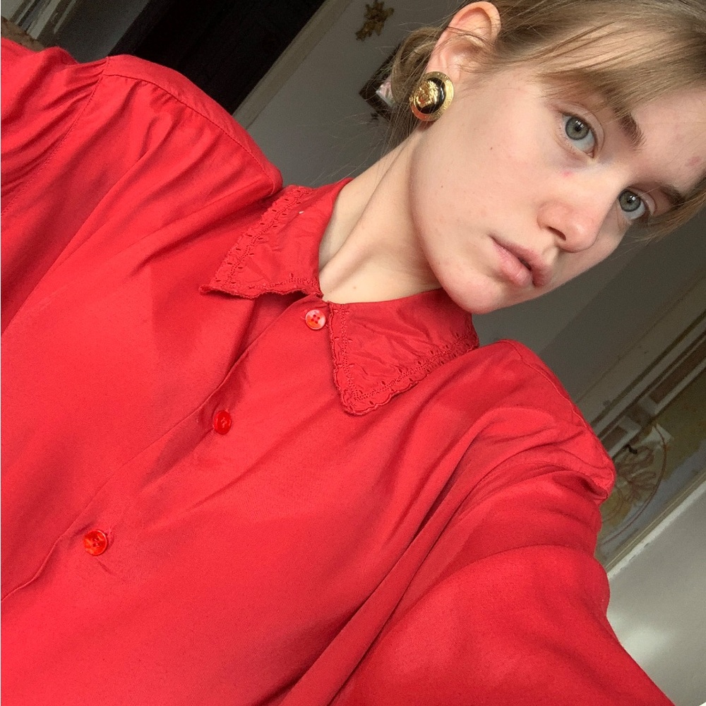 Red embroidered blouse